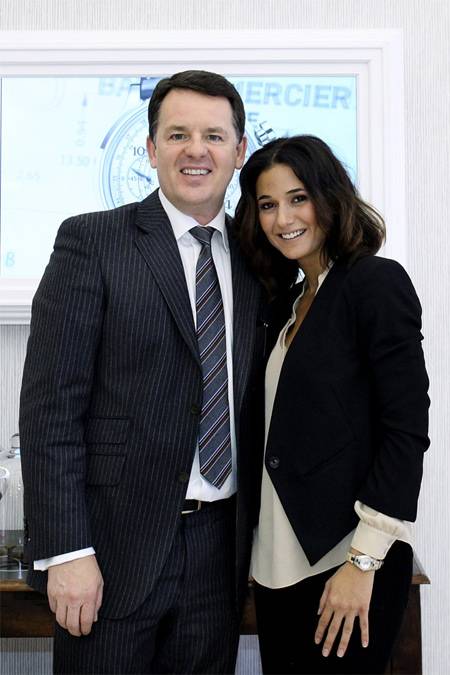 El CEO de Baume & Mercier Alain Zimmerman y la actriz Emmanuelle Chriqui