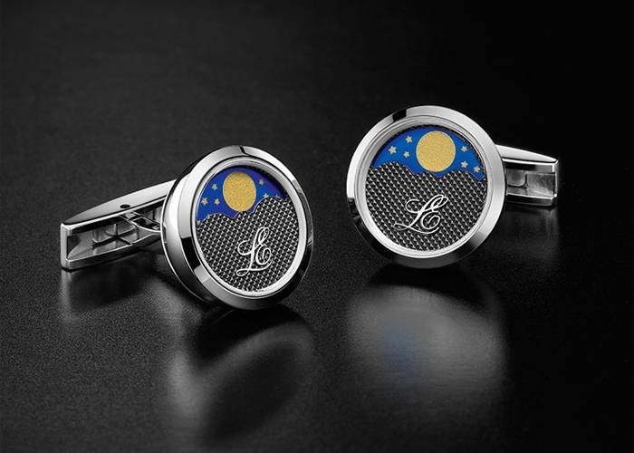 Gemelos a juego en acero de Louis Erard compuestos por una fase lunar central bajo cristal mineral