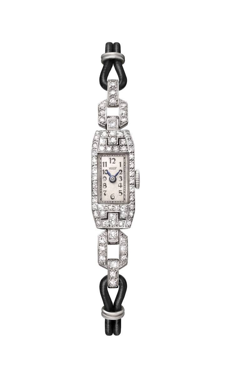 Reloj 'baguette' de platino para señora, engastado con diamantes y montado sobre un cordón, fechado en 1925. Colección del Museo Tissot. E00012337.