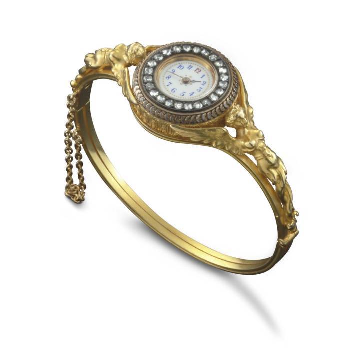  Reloj de pulsera con una escultura de dos diosas aladas, 1889